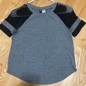 H&M tee with see through material on shoulders
